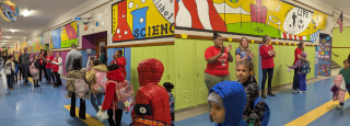 Priest clap in for students
